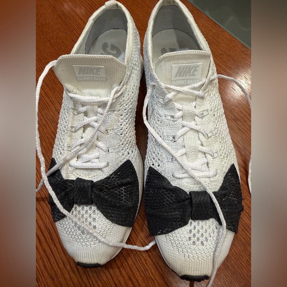 Nike Flyknit Racer Sneakers with Black Bow Detail